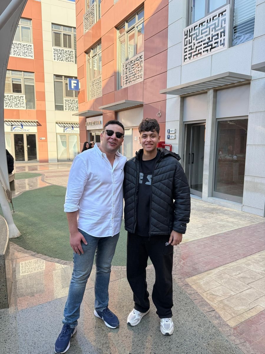 Mr. Karim with a student